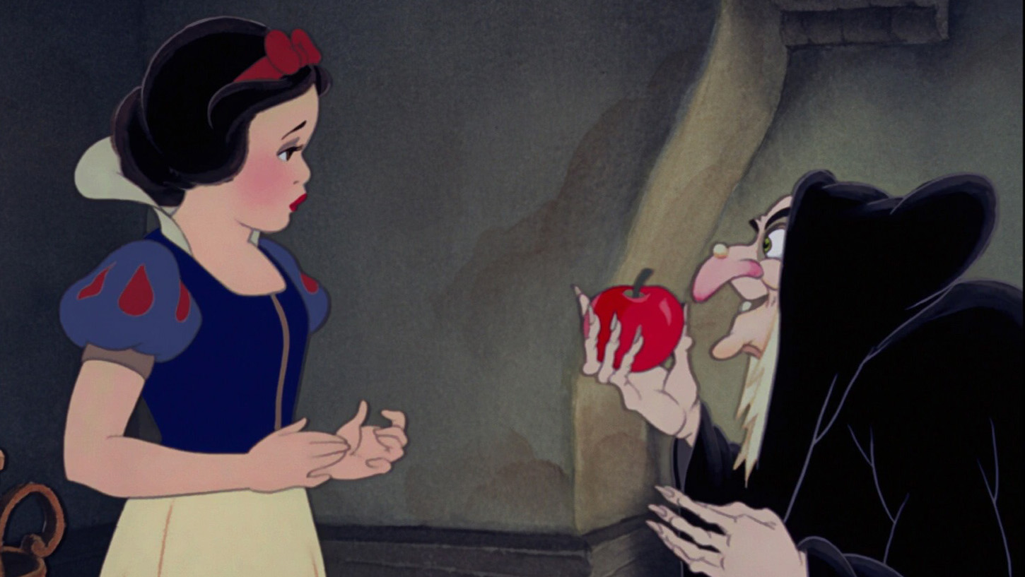 A witch offering a poison apple